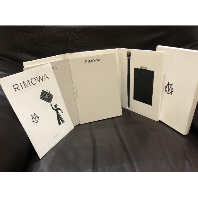 

Rimowa LVMH luggage tag + sticker + buku garansi + manual