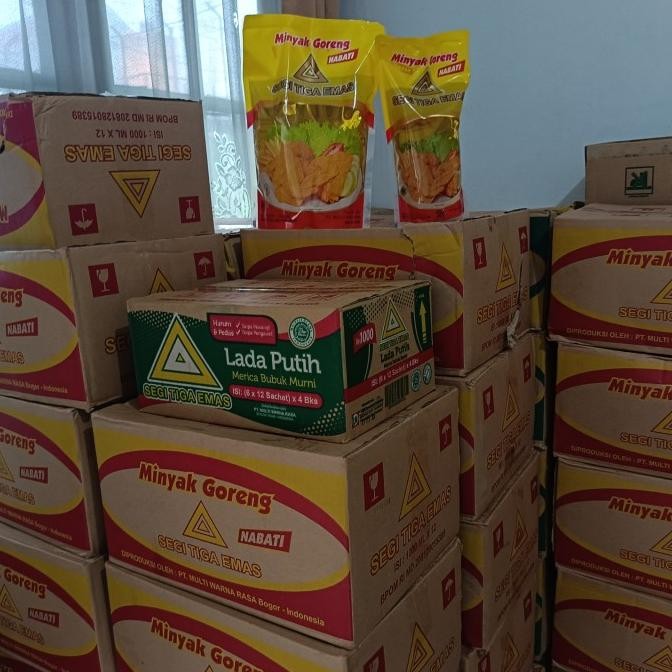 

minyak goreng segitiga emas 1 Liter 1 dus