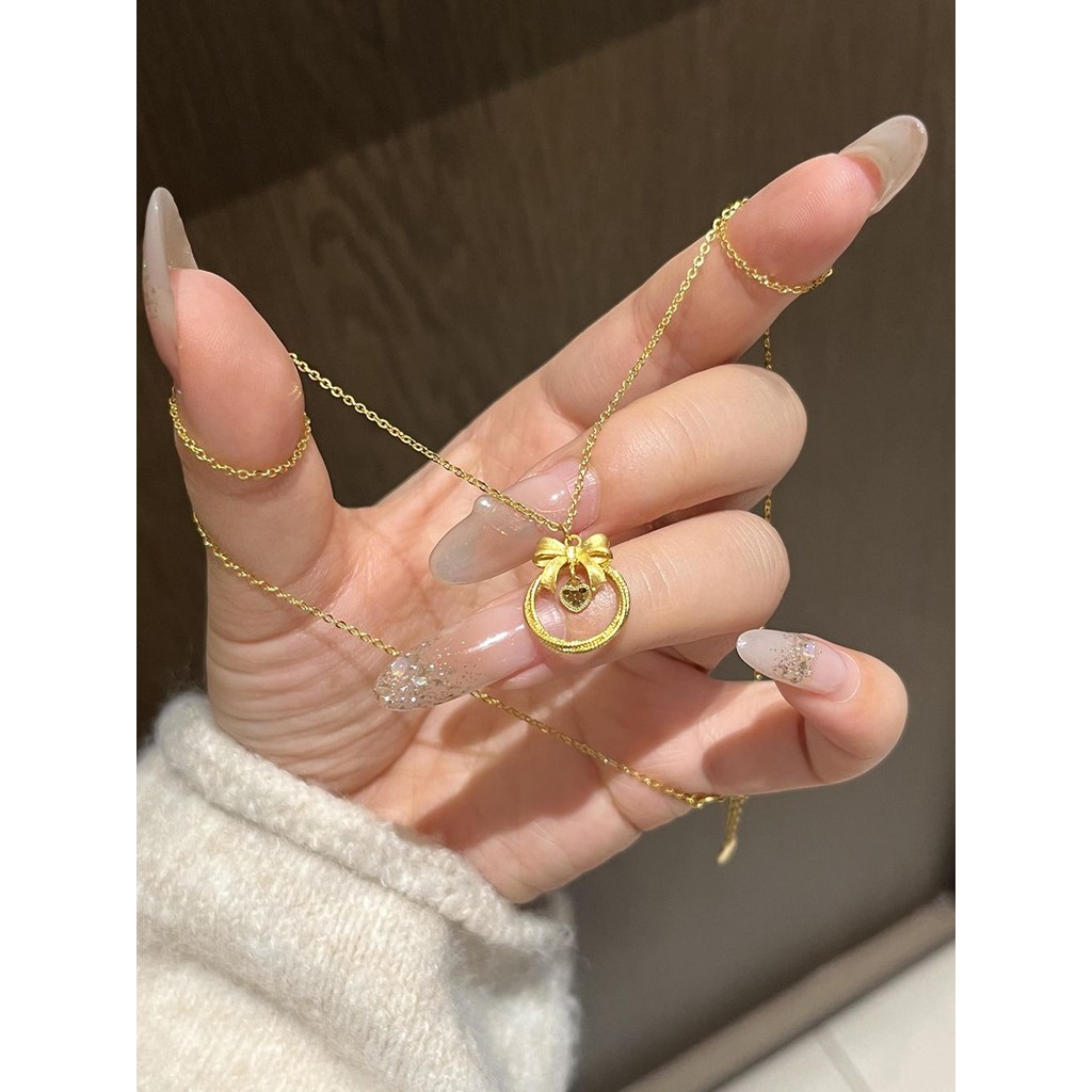 New Flash Scale Heart Garland Bow Necklace