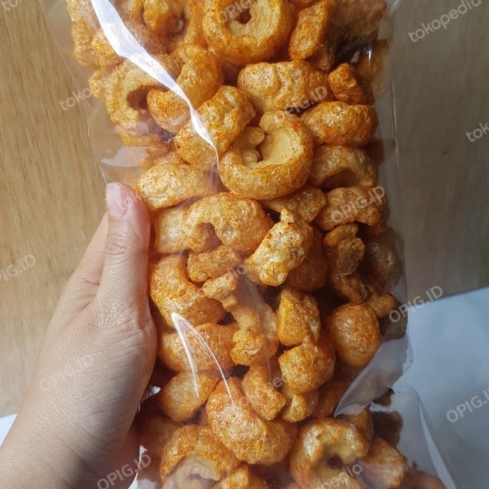 

KERUPUK KULIT BABI/KRUBI/KERUPUK KULIT BABI SAMCAN OPIG 250GR
