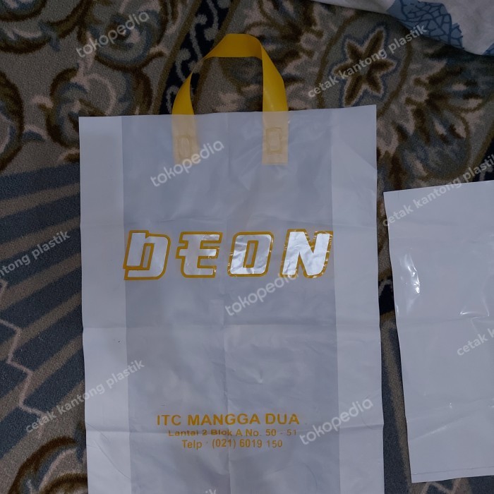 

Kantong Belanja Sablon 35 x 49 putih susu tali Press