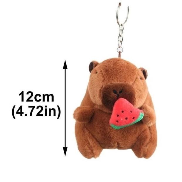 Boneka Capybara Makan Buah Bisa Ditarik Gantungan Tas Kunci Ganci Souvenir Lucu GM