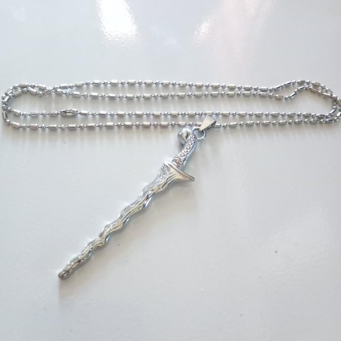 *****] kalung pria titanium keris kuning sakti mandraguna