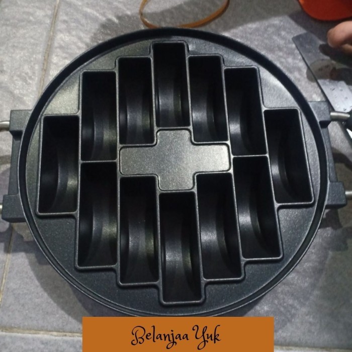 

TERLARIS CETAKAN PUKIS HAPPY CALL 12 LUBANG / CETAKAN KUE PANCONG ANTI LENGKET