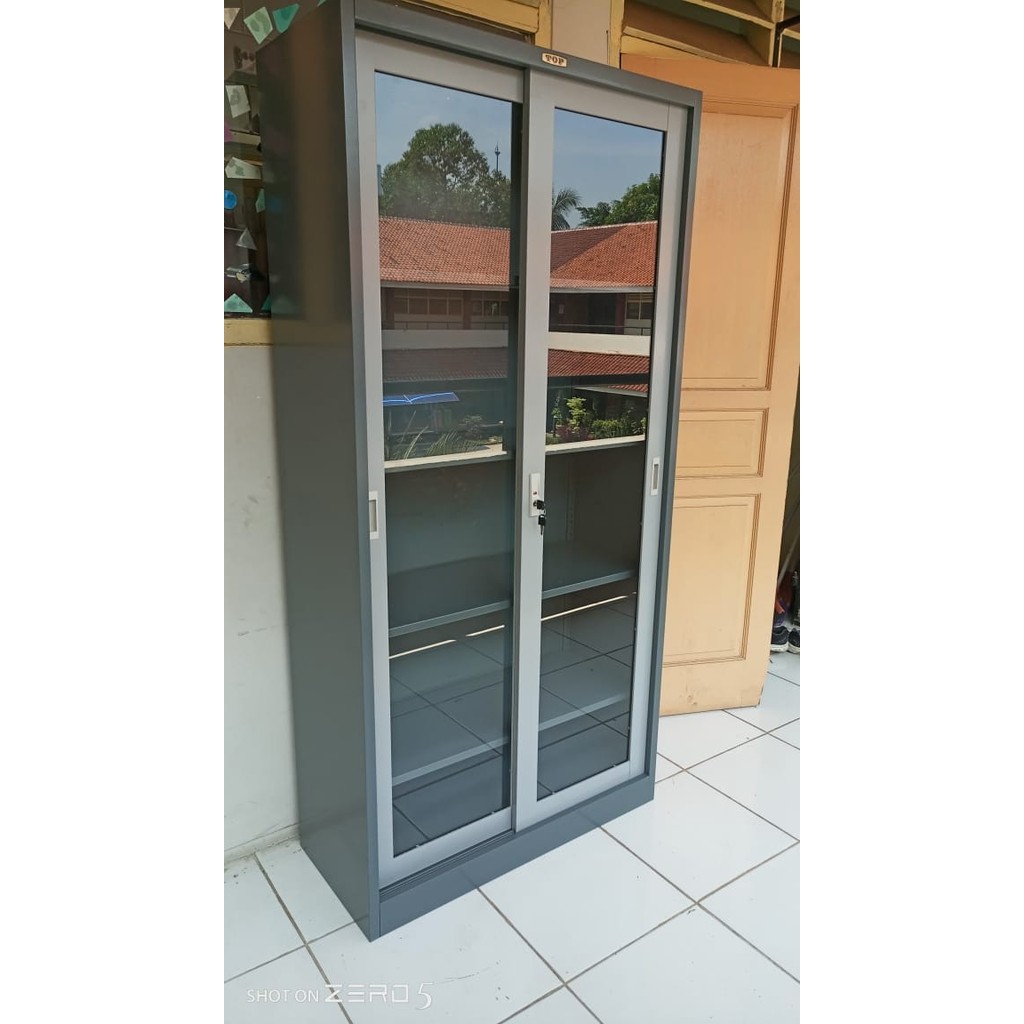 

LEMARI ARSIP PINTU GESER KACA