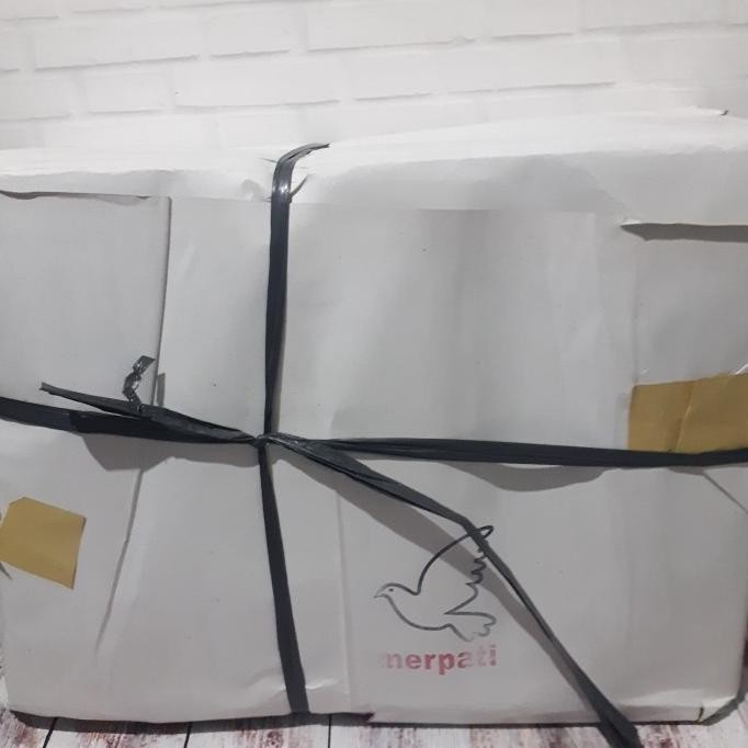 

Kertas putih buram burem koran kw2 32x45 untuk bungkus nasi padang 10kg