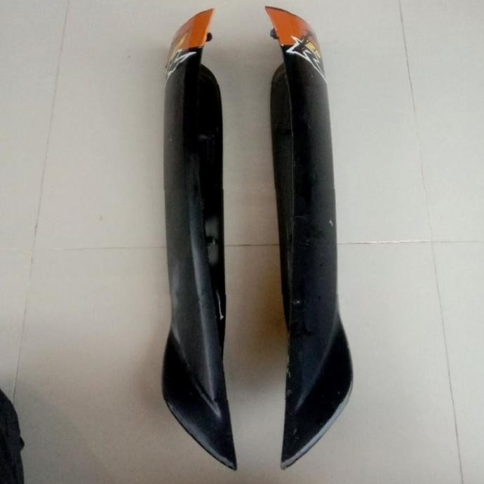 Sparepart dan Aksesoris kendaraan  Sayap Luar bawah Honda Supra x 125 lama old. Original. seken beka