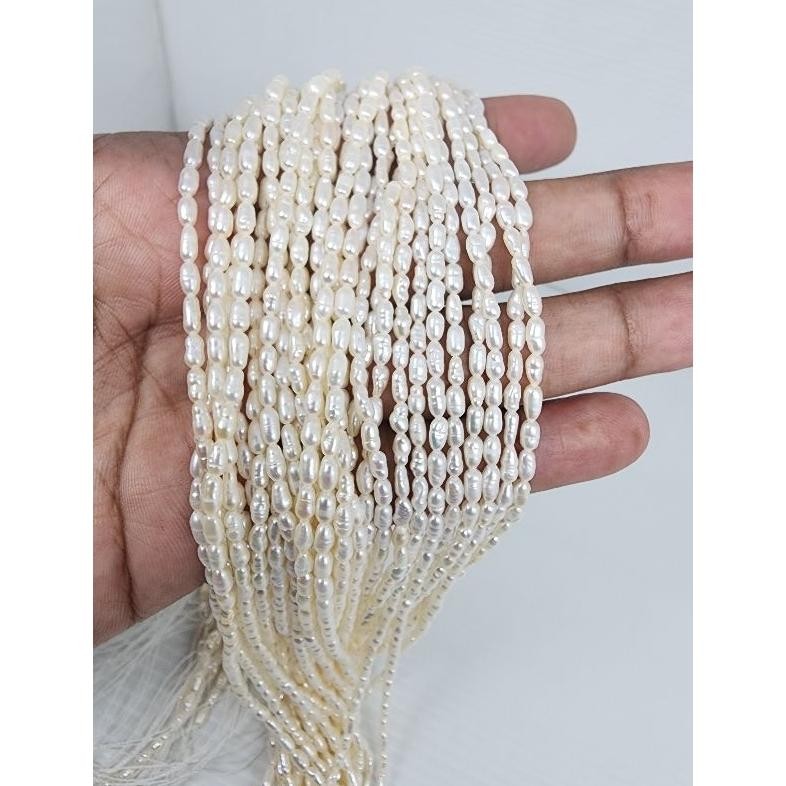 sfI MUTIARA AIR TAWAR BERAS PUTIH 2-3MM PER UNTAI AST