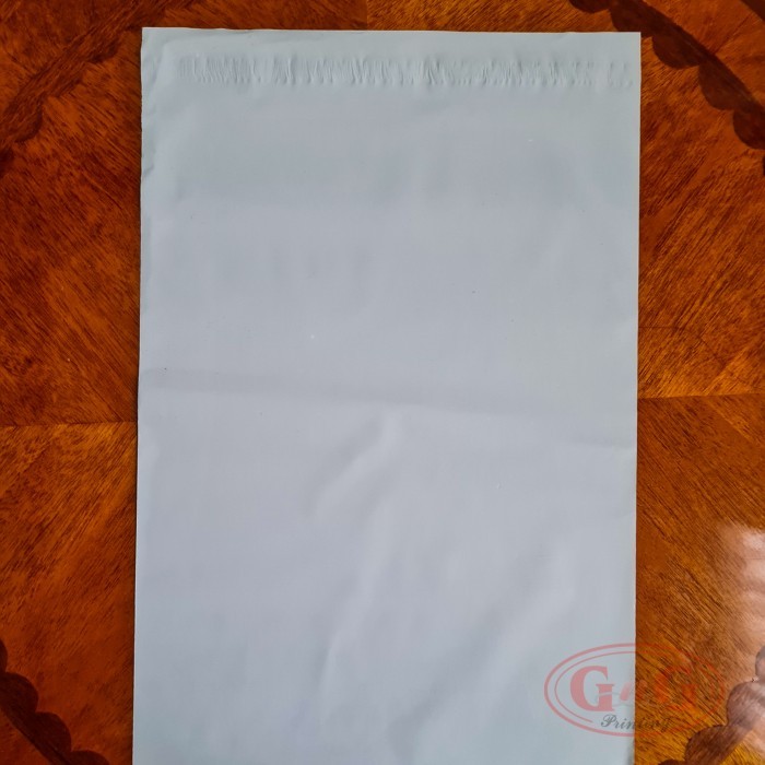 

Plastik Polymailer 32X40 100Pcs Putih Susu Polos Packing Amplop