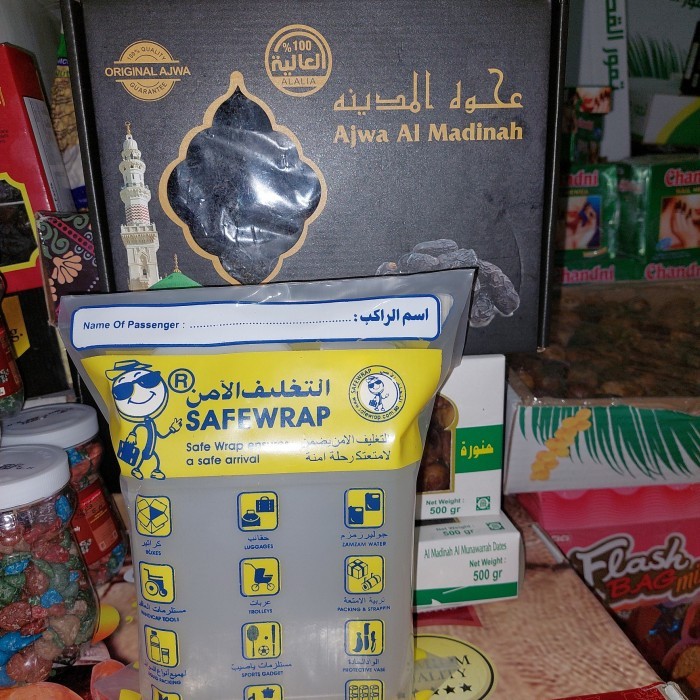 

paket hemat 1 liter air zam zam dan 1kg kurma ajwa