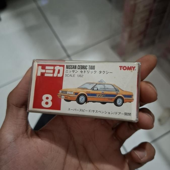 Tomica 1:62 Nissan Cedric Taxi (Orange)