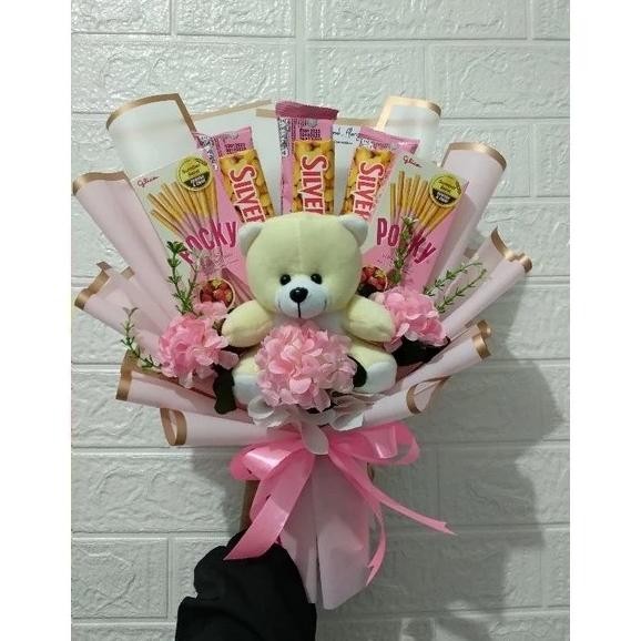 

buket,buket coklat,buket snack,buket wisuda,wisuda,valentine,hari guru Terlaris