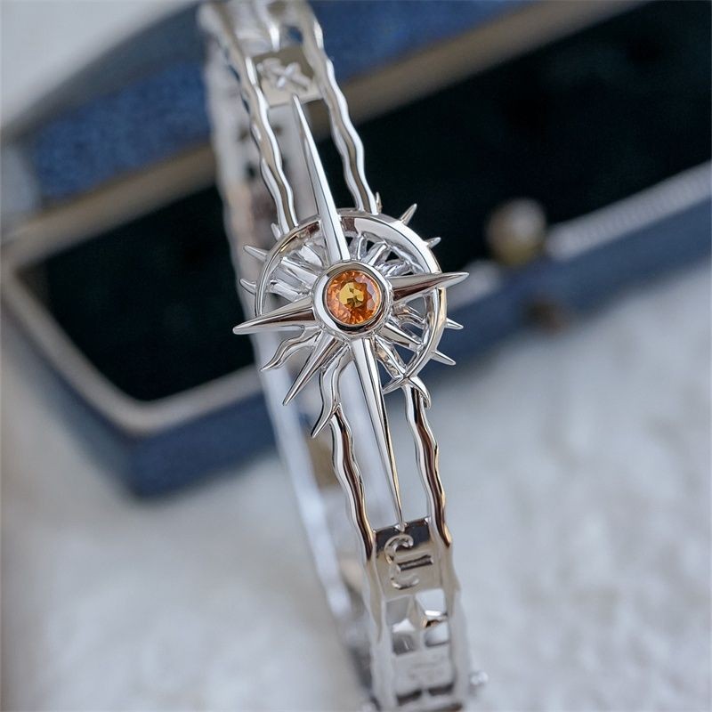 Gelang Langit Berbintang dengan Cahaya Matahari dan Bulan yang Terjalin