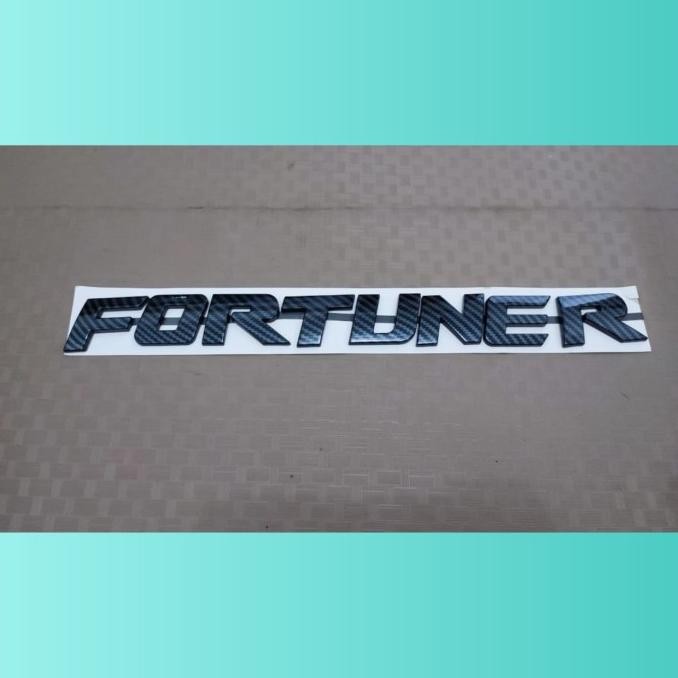 EMBLEM KAP MESIN TULISAN FORTUNER WARNA CARBON ORIGINAL