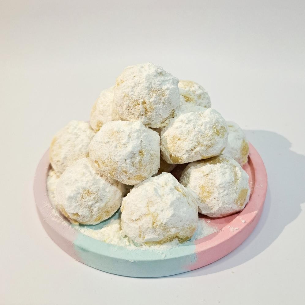 

jg-8 Kue Putri Salju Susu Bibasnacks ( Gratis kue sagu / semprit kemasan Pouch ) Berkualitas