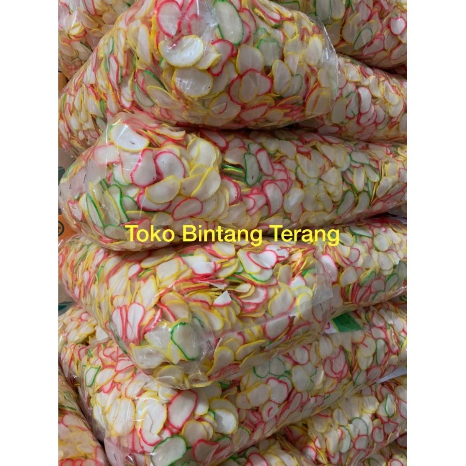 

KERUPUK / KRUPUK BAWANG PUTIH SPESIAL UDM 1 BAL DUS 5 KG WARNA WARNI