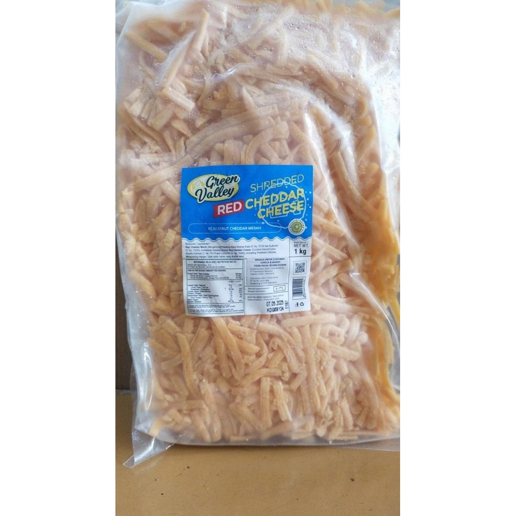

Grosir Shredded Red Cheddar Cheese 1Kg / Orange Cheddar Shredded / Keju Cheddar Parut - 100% Halal