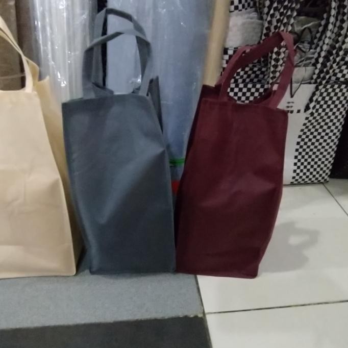 

tas kain spunbond buat toples dan botol isi 12 pcs terlaris dan termur murah