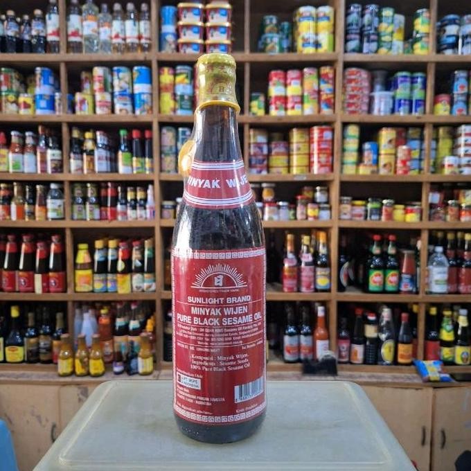 

EXP LAMA SUNLIGHT BRAND MINYAK WIJEN/ PURE BLACK SESAME OIL 640ML