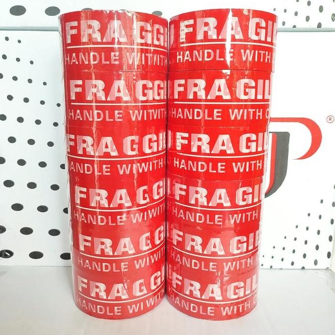 

Promo 1 LUSIN / 12 Pcs - Lakban Fragile Merah Jago Pack Indonesia 48 mm x 100 Yard - Lakban Jangan Di Banting COD