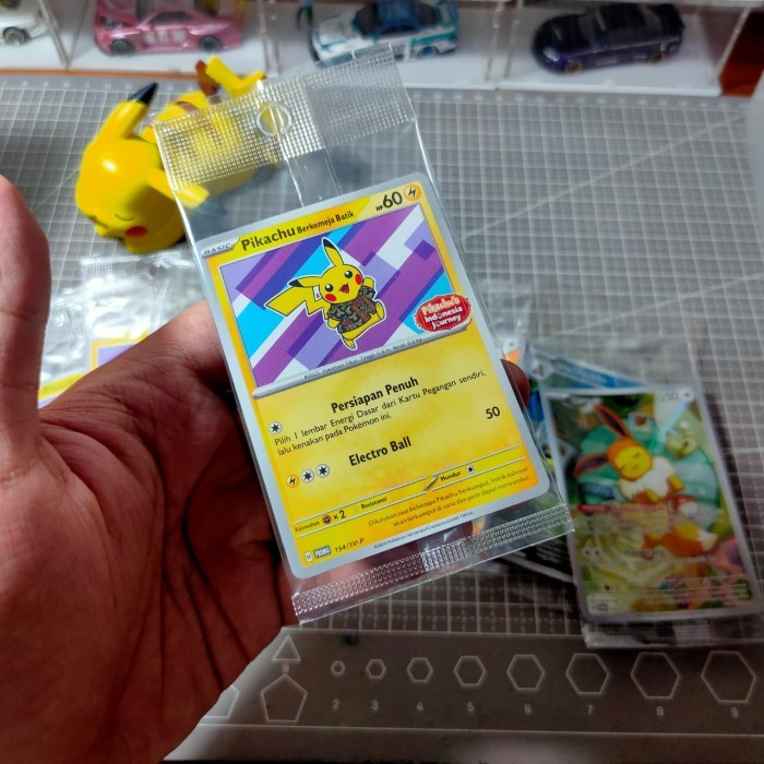 Kartu Promo Pokemon TCG Pikachu Berkemeja Batik Xatu Ungu Staryu Biru Alolan Dugtrio