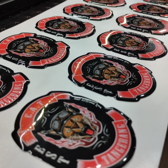 

CETAK STIKER TIMBUL RESIN 3D & SUPER GLOSS POTONG KISS CUT - SIFATNYA LENTUR, BISA INDOOR OUTDOOR