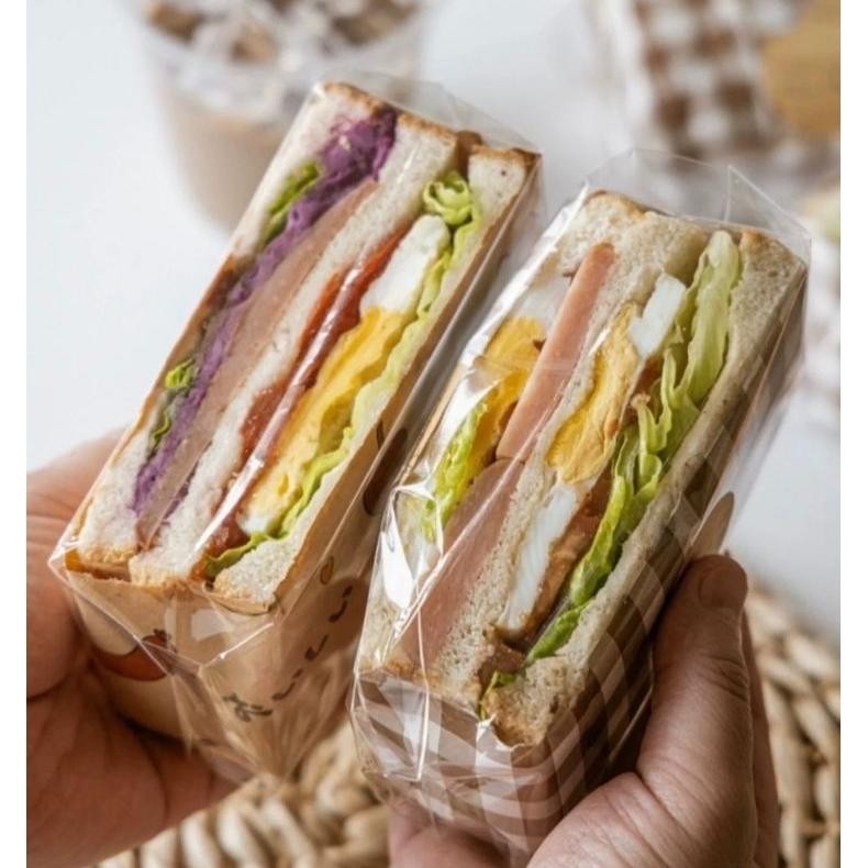 

Ready 50 Pcs Plastik Opp Transparan Plastik Bening Sandwich Pembungkus Sandwich Bungkusan Sandwich Packaging Roti Lapis