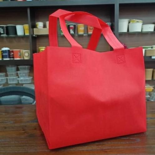 

ready stock Tas Handle Spunbond Lebar 27cm Untuk Box 25cm. isi 12 pcs.