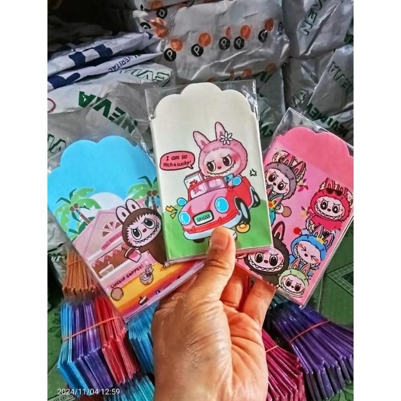 

PROMO (500 lembar) belum di lem, amplop lebaran medium free plastik a-81