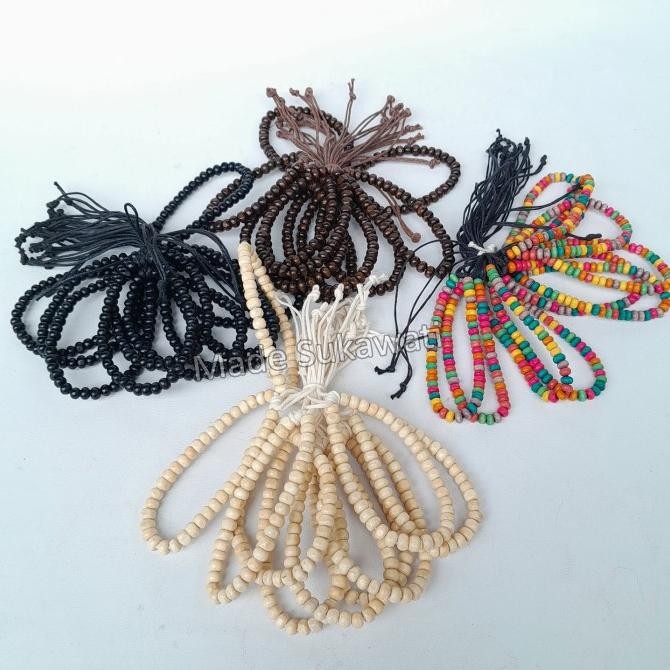 

.........] Gelang tali bola kayu