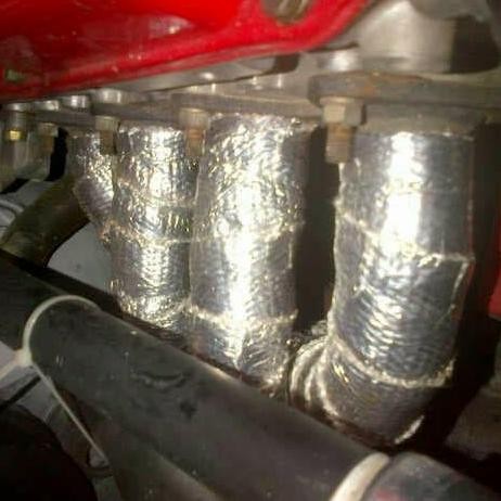 . PEREDAM PANAS HEADER KNALPOT MOBIL