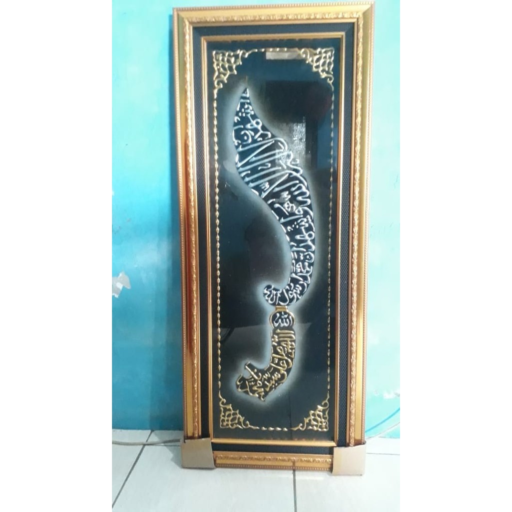 

KALIGRAFI SHOLAWAT NABI MODEL KUJANG KEMBAR 1 SET UKURAN 40X100 CM