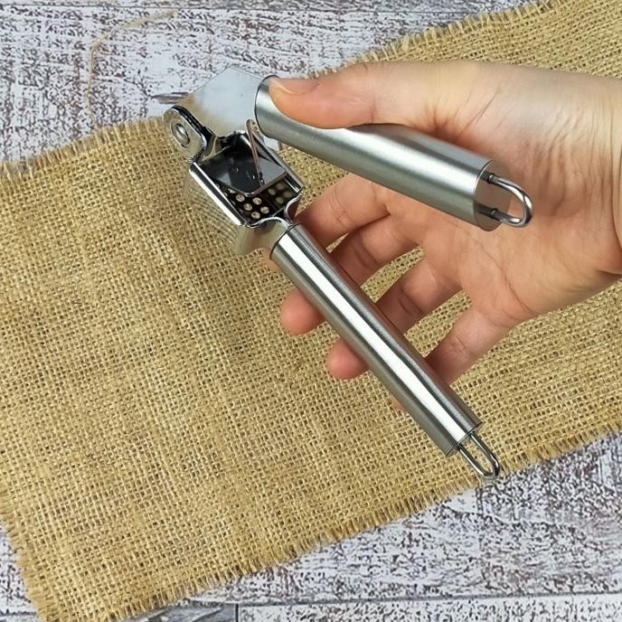 

GARLIC PRESS ONION SLICER PENGHANCUR BAWANG CAN OPENER SERBAGUNA ORIGINAL