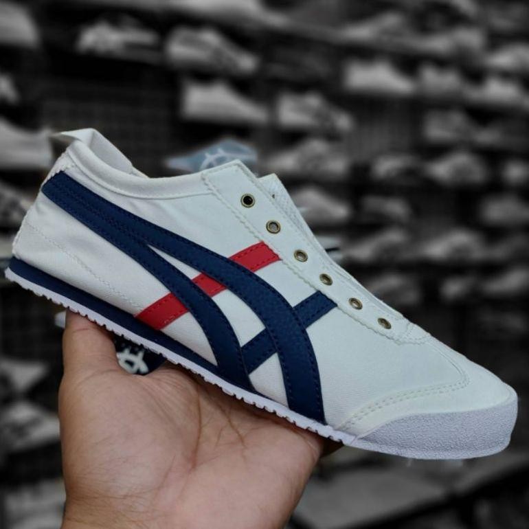 Sepatu Sneakers Wanita Pria Slip On Slop Tanpa Tali Termurah