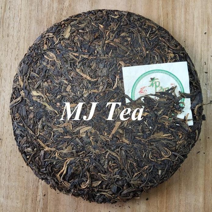 

Yunnan Puerh Tea Lao Man E Bu Lang Qiao Mu Raw Puer Cake 357 Gr Maison Auratea
