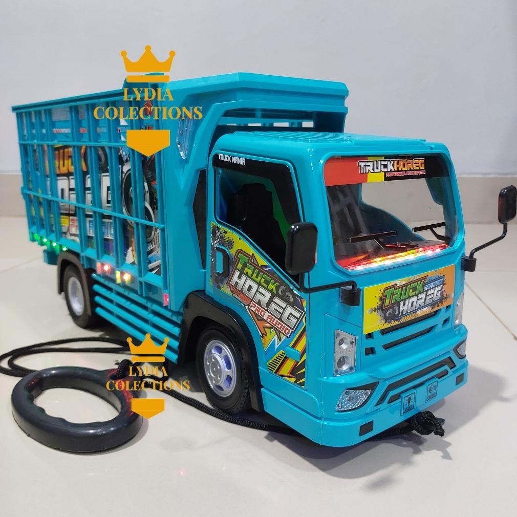 Mainan Truk Basuri Oleng Telolet Jumbo Lampu Bisa Tarik AST