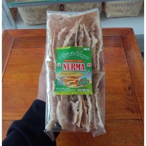 

Revolusioner Kripik Tempe Renyah Gurih Khas Ngawi Nurma Kemasan 180Gram.