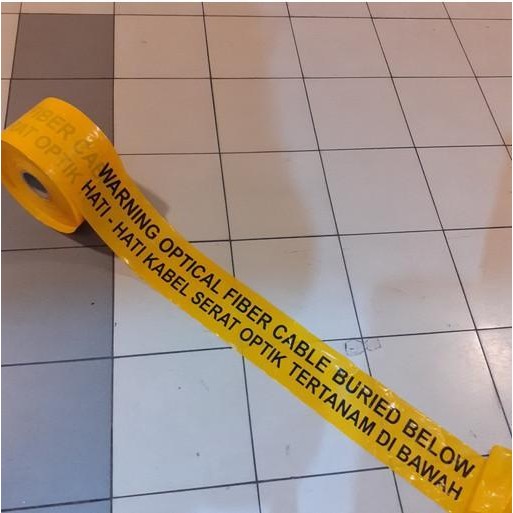 

Warning Tape Optical Fiber Cable Buried Below - Pita Pembatas Original Dan Terpercaya