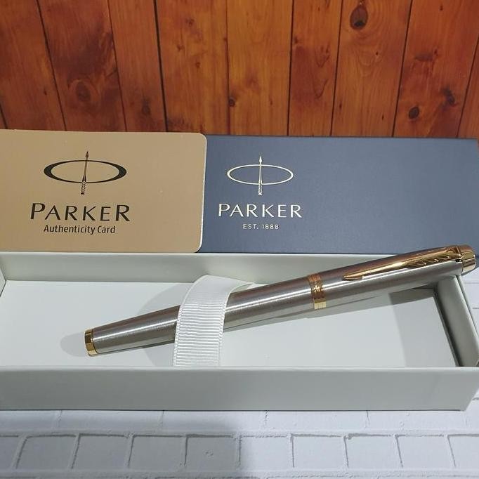 

Parker Im New Brushed Metal Stainless Gold Trim Roller Ball
