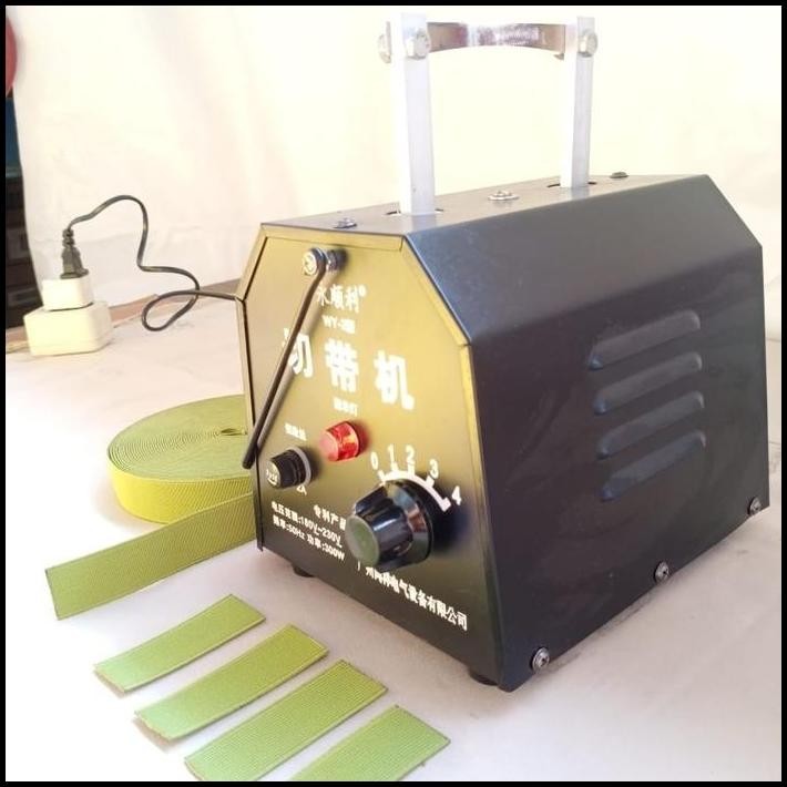 

Mesin Potong Cutting Pita Label Webbing Bisban Hot Cut