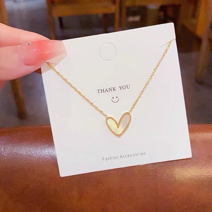 Promo K135 Kalung TITANIUM Wanita Rantai Nori Kecil Bandul Love Keramik Putih Elegant Emas Perhiasan