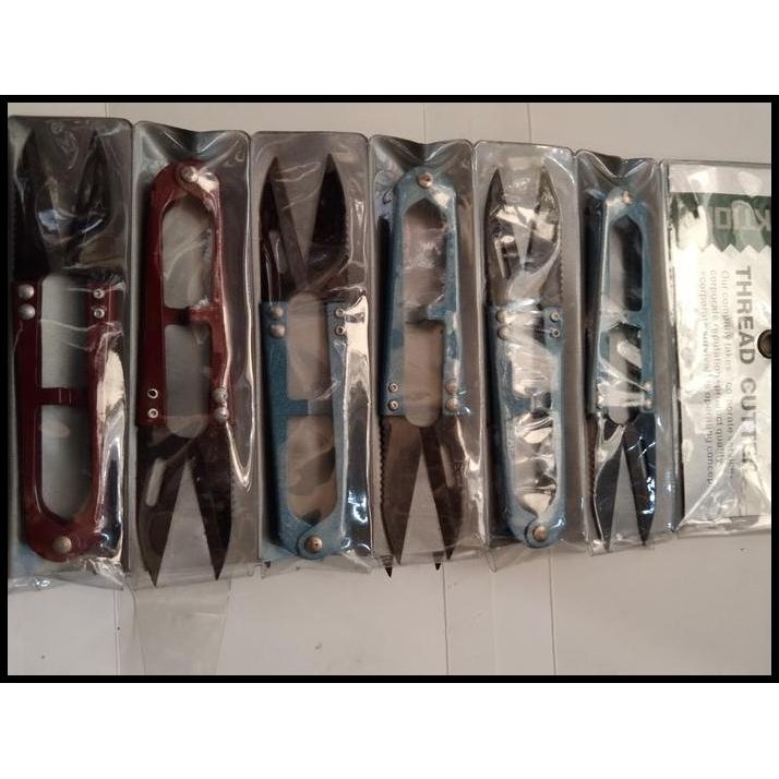 

Gunting Buang Benang Action Bergerigi