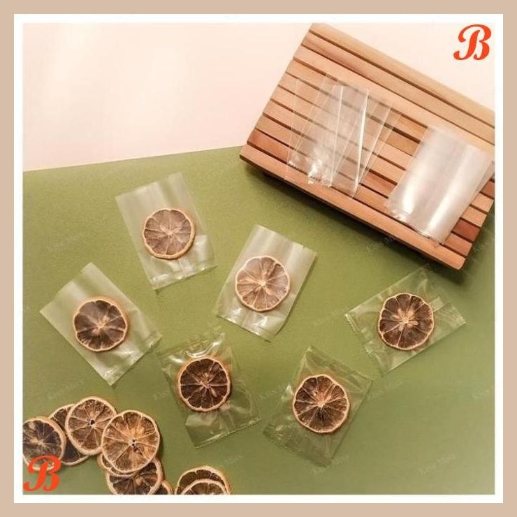 

| NS | PLASTIK OPP COOKIES TANPA LEM - 5,5X8,5 - TEBAL - BIJI - NASTAR - KUE