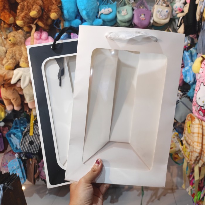 .........] PAPER BAG IMP TRANS UKURAN 35X25X16 BAG 4 / PAPER BAG MOTIF BENING BAG DEPAN / TAS KADO