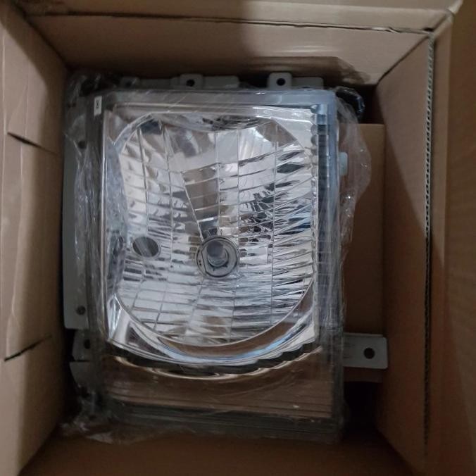 lampu depan isuzu NMR71.kanan-kiri ori