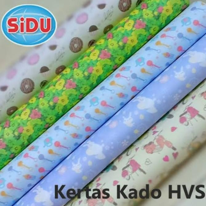 

GROSIR !!! KERTAS KADO MOTIF SIDU / SINAR DUNIA / 50lembar murah