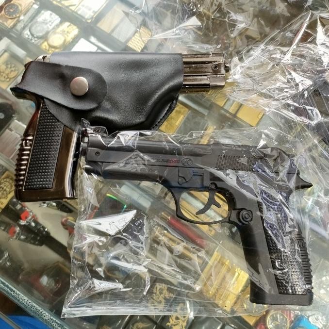 pistol korek api besi kokang