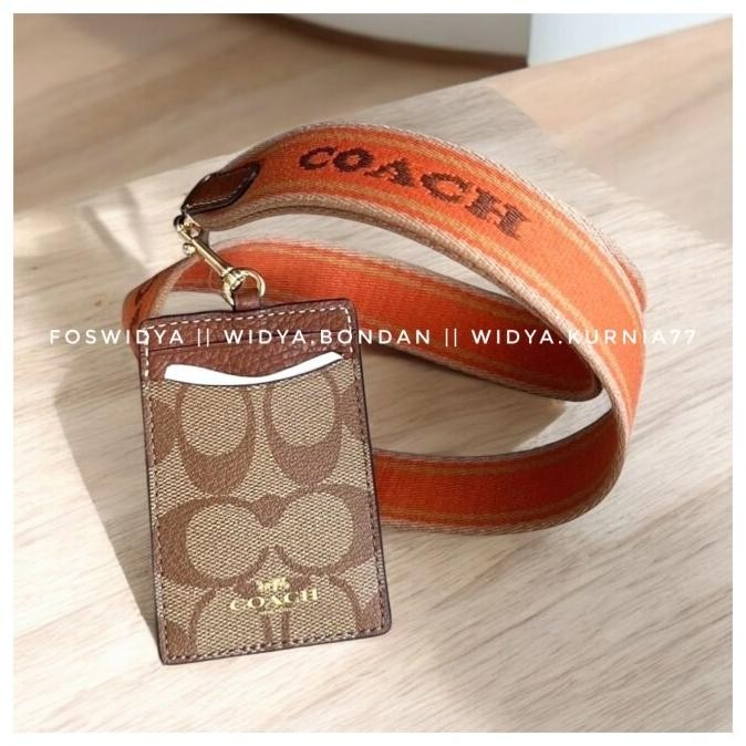 

new !!! Lanyard Coachh Signature Saddle Multi with wide strap - New with tag murah