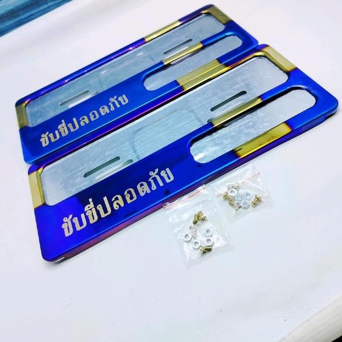 

BINGKAI PLAT NOMOR TWOTONE TULISAN MINION SNI 2 BIJI(2 PC )RUMAH PLAT NO SNI TULISAN THAILAND BISA UNTUK SEMUA JENIS MOTOR CAR TERMURAH