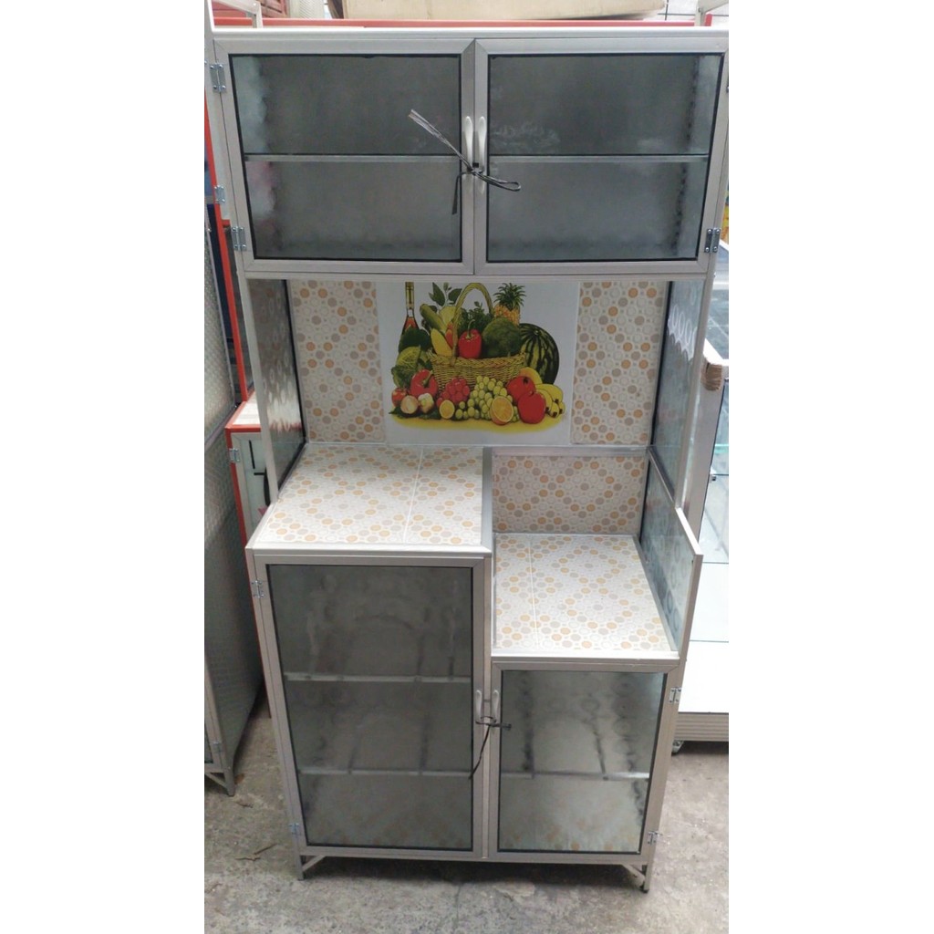 Lemari Piring Rak Piring Kaca 2 Pintu Alas Keramik Magic Seng Bogor